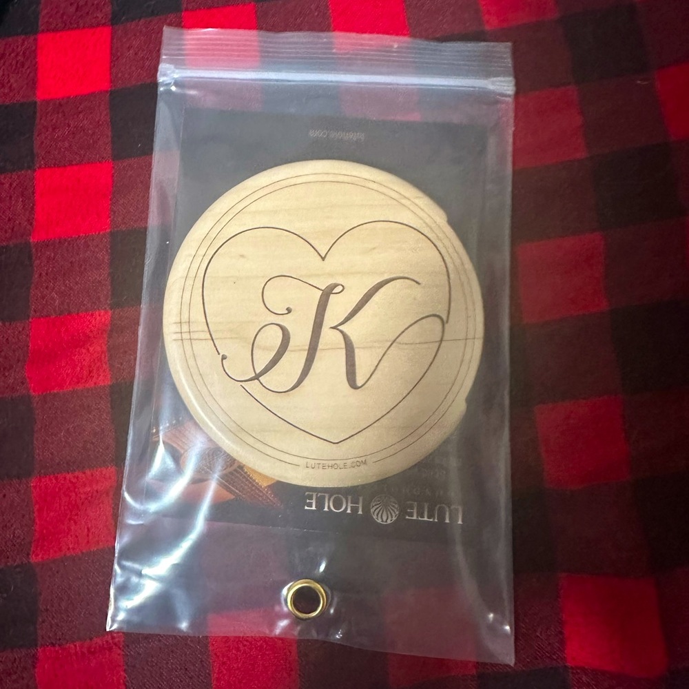 Lutehole custom sound hole cover.